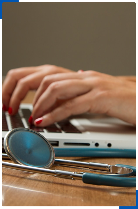 Stethoscope and typing hands